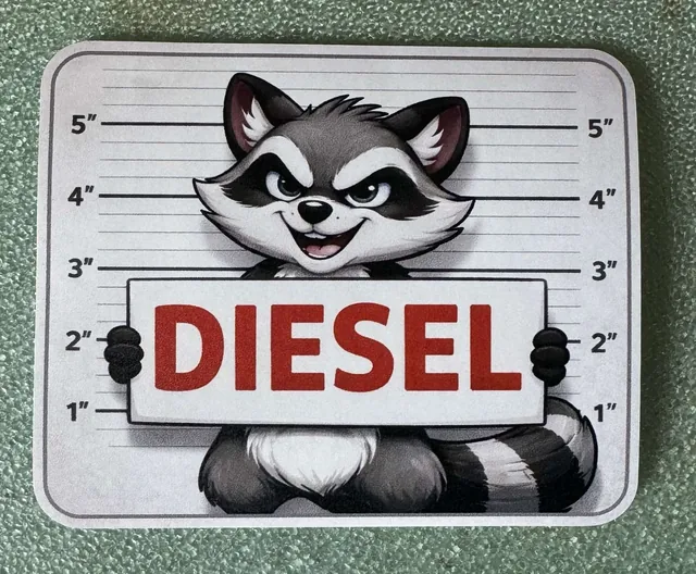 Наклейки на бензобак авто — Наклейка вінілова DIESEL Єнот (11,5х9 см)