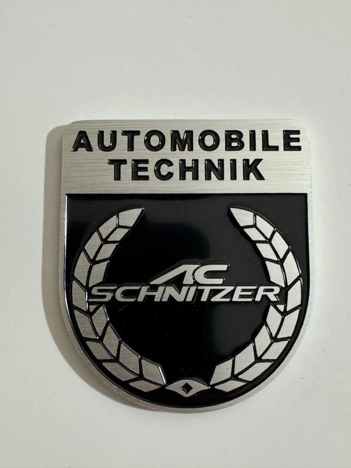 Эмблема металлическая AC SCHNITZER (6.3х5.5 см) черно-серебристая на скотче